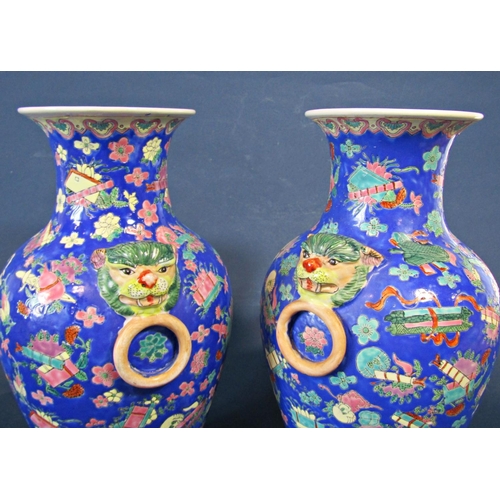 1088 - Pair of 20th Century Chinese Porcelain Baluster Vases, decorated with ornaments and flowers on a blu... 