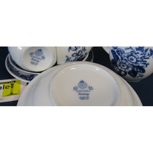 1102 - A Royal Worcester Hanbury pattern tea service for eight with floral panels