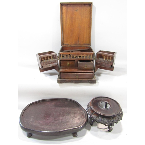 1470 - A 19th century Chinese hardwood travelling box with two swing out front compartments below a hinged ... 