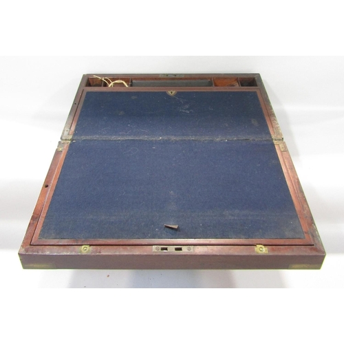 1472 - A 19th century  mahogany writing slope, with brass banding, opening to reveal a felt lined slope ove... 