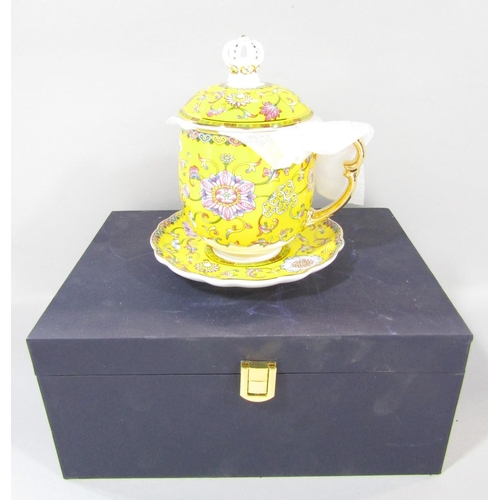 1482 - A boxed Chinese yellow and gold floral decorated covered cup and saucer in yellow silk lining, a Jap... 