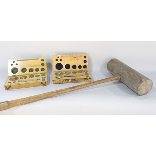 1489 - A regular size croquet mallet, and two sets of incomplete weights in identical wooden boxes.