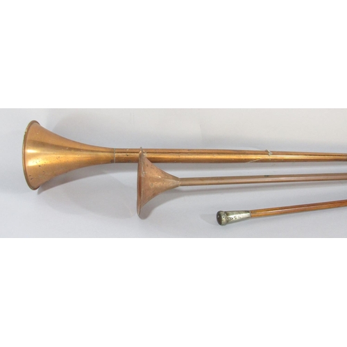 1492 - A long brass copper coaching horn 125cm, another similar shorter horn 91cm and a military baton with... 