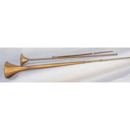 1492 - A long brass copper coaching horn 125cm, another similar shorter horn 91cm and a military baton with... 