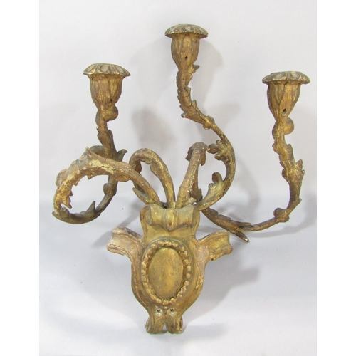 1500 - A pair of 19th century gilt gesso and iron constructed wall candle sconces, in a distressed state an... 