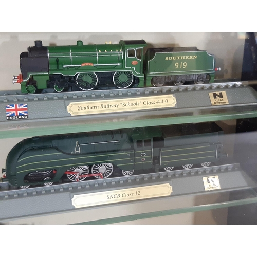 250 - Two display cases by 'Picture Pride' containing 29  N gauge static railway models of worldwide locom... 