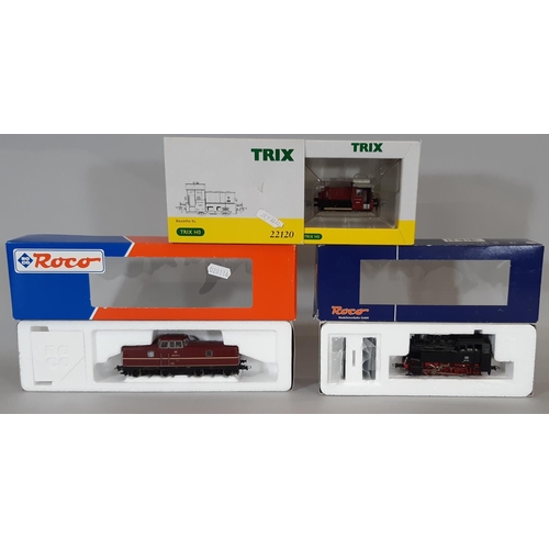 276 - Three boxed HO gauge model locomotives including Roco Class 280 diesel 63382, Roco steam locomotive ... 