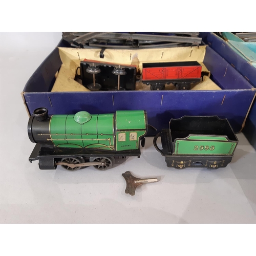 272 - 2 O gauge Hornby train sets including post-war no 601 Hornby LMS Goods set, comprising  clockwork 0-... 