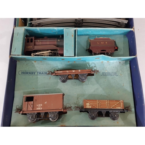 272 - 2 O gauge Hornby train sets including post-war no 601 Hornby LMS Goods set, comprising  clockwork 0-... 