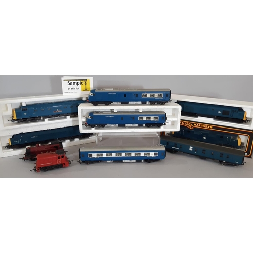 263 - Boxful of OO and HO gauge railway models including the following in BR blue; Class 42 'Kelly' diesel... 