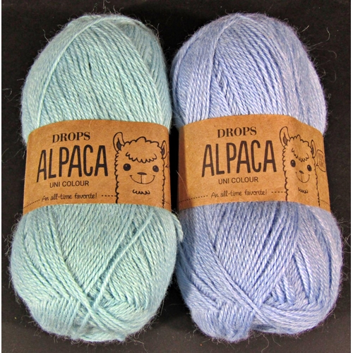 1535 - 48 balls of 50g wool by Drops including 40 unused in various shades of blue, 100% alpaca, and 8 ball... 