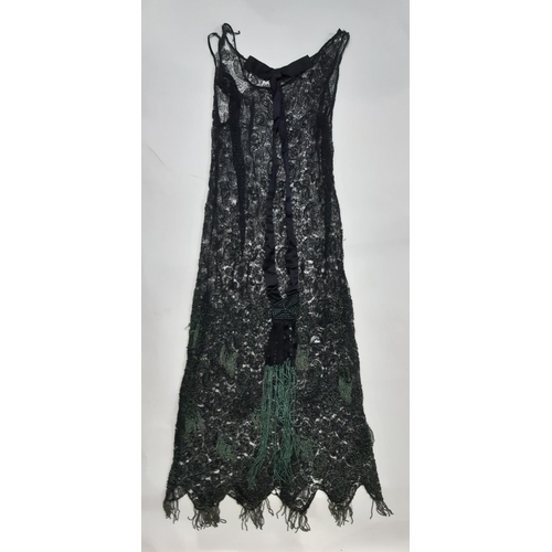 1560 - Mixed vintage textiles including a beaded evening dress circa 1930's of black lace extensively embel... 