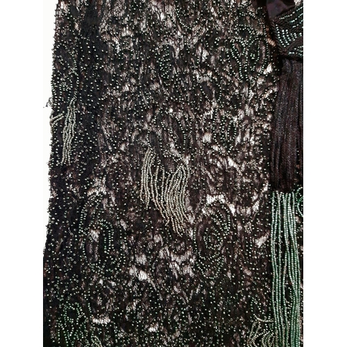 1560 - Mixed vintage textiles including a beaded evening dress circa 1930's of black lace extensively embel... 