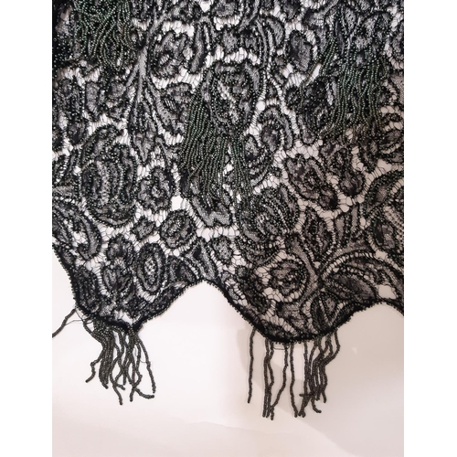 1560 - Mixed vintage textiles including a beaded evening dress circa 1930's of black lace extensively embel... 