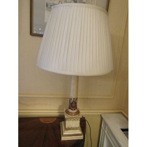 1523 - A pair of reproduction Georgian style column lamp in armorial detail on square cut base