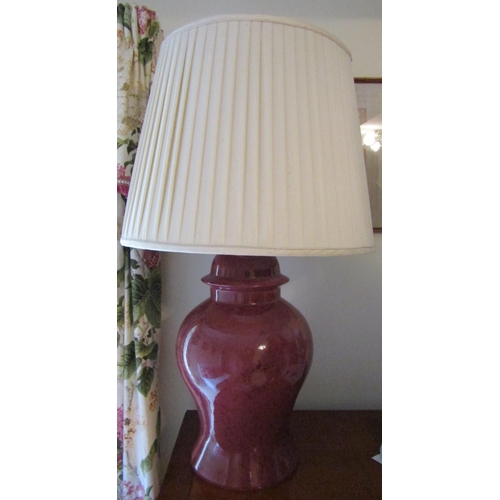 1524 - A Chinese oxblood baluster shaped table lamp 90 cm high