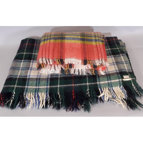 1557 - 2 woollen blankets including a Mackenzie tartan blanket/ travel rug by Chalmers of Oban 1.9x1.5m and... 