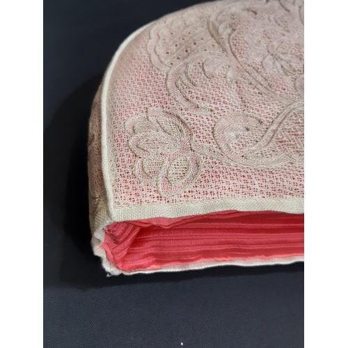 1558 - Exhibition lacework pieces; a handmade tea cosy (1960's) in counted thread lacework with pink lining... 