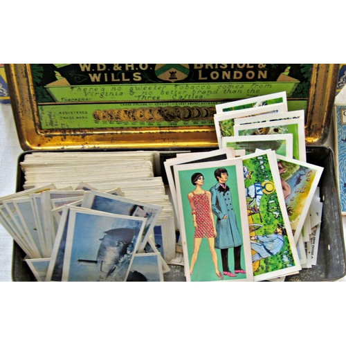 232 - Cigarette card albums including Wills and Players with later examples by Lyons Tea, Fry's, Geoffrey ... 