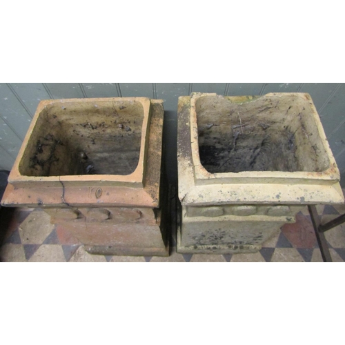 2016 - A pair of weathered buff coloured chimney pots with unusual repeating disc collars (probably Doulton... 