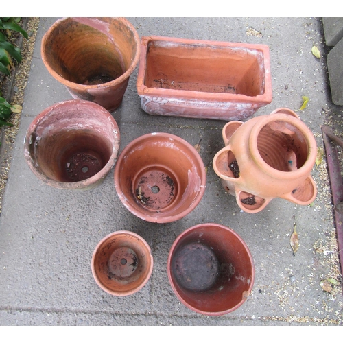 2022 - A small terracotta strawberry planter 31 cm high, a further rectangular planter and five terracotta ... 