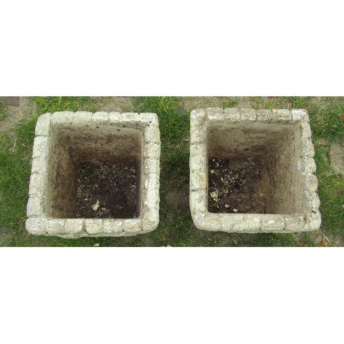 2028 - A pair of painted and weathered Cotswold studios square tapered mock stone wall effect planters 34 c... 