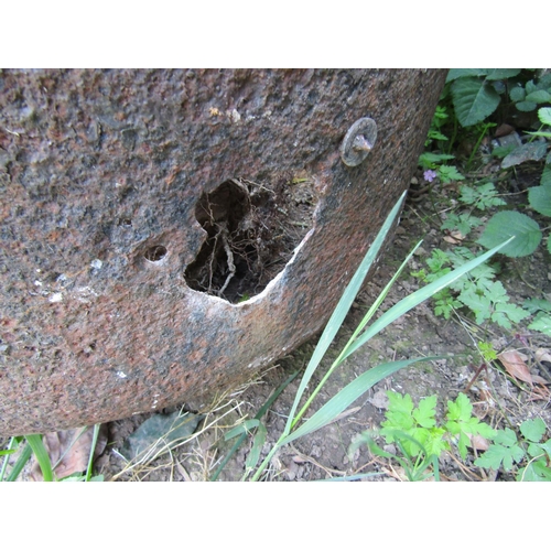 2057 - A large antique cast iron cauldron 75 cm diameter (af) containing an established olive tree together... 