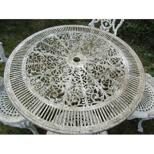 2059 - A cream painted cast aluminium garden terrace table with decorative circular pierced top 80 cm diame... 