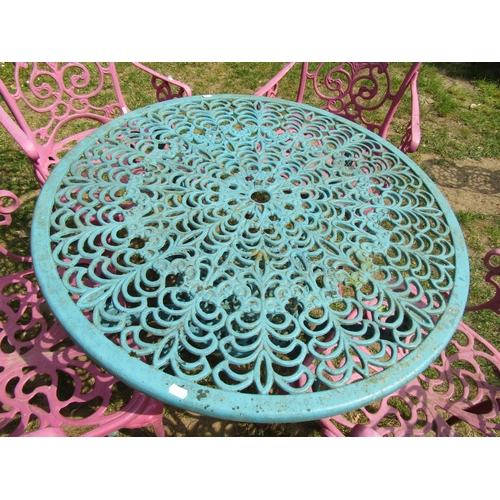 2060 - A cast aluminium garden terrace table with decorative pierced circular top 86 cm diameter together w... 