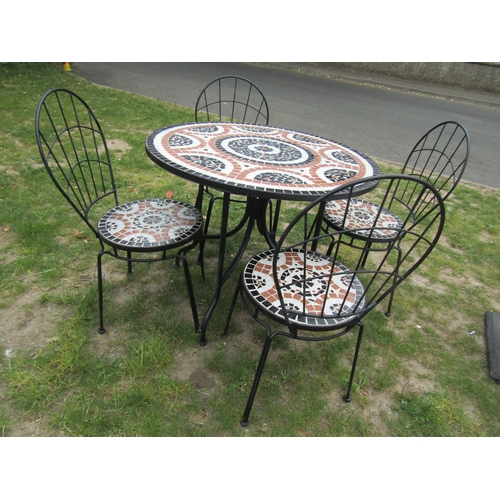 2064 - A five piece garden terrace set comprising circular top table, 90 cm diameter and a set of four matc... 