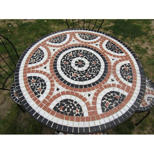 2064 - A five piece garden terrace set comprising circular top table, 90 cm diameter and a set of four matc... 