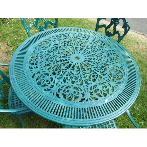 2065 - A green  painted cast aluminium garden terrace table of circular form with decorative pierced top, 1... 