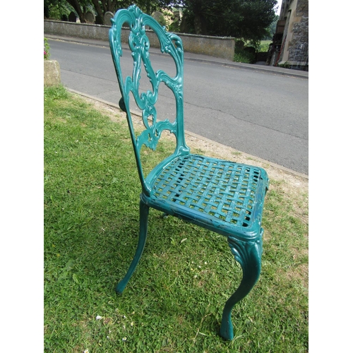 2065 - A green  painted cast aluminium garden terrace table of circular form with decorative pierced top, 1... 