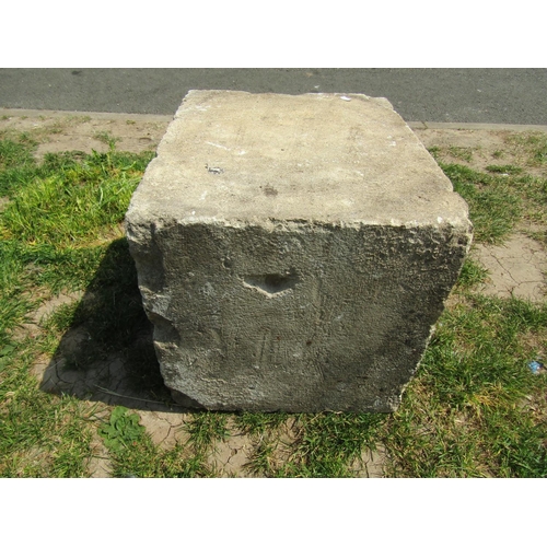 2068 - A weathered cut stone mounting block/architectural stone 45 cm x 38 cm x 38 cm