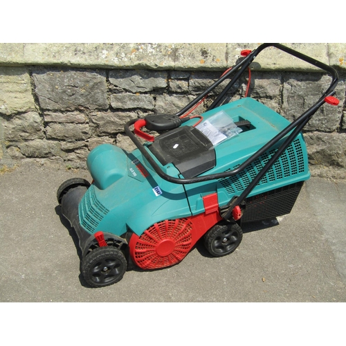 2162 - A Bosch ALR900 electric lawn raker together with a Flymo electric garden vac (2)