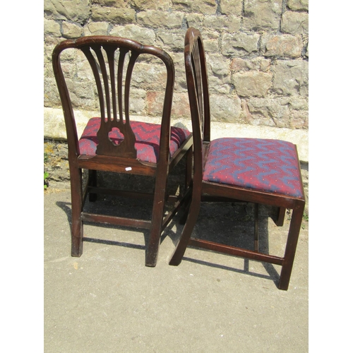 2172 - A set of four Georgian style mahogany comb back dining chairs with pierced quatrefoil splats over dr... 