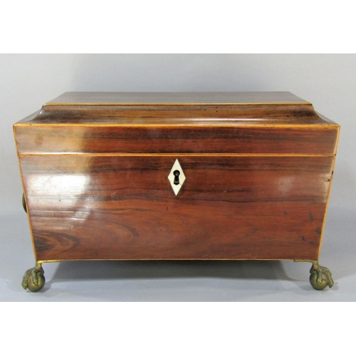 1481 - A Regency mahogany sarcophagus shaped tea caddy, with satin wood stringing with two lined caddies an... 