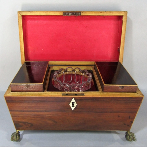 1481 - A Regency mahogany sarcophagus shaped tea caddy, with satin wood stringing with two lined caddies an... 