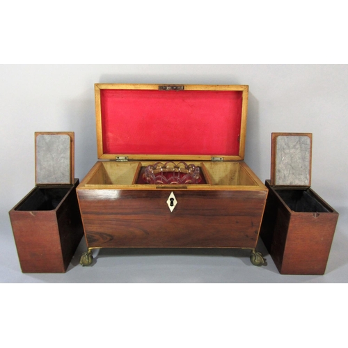 1481 - A Regency mahogany sarcophagus shaped tea caddy, with satin wood stringing with two lined caddies an... 