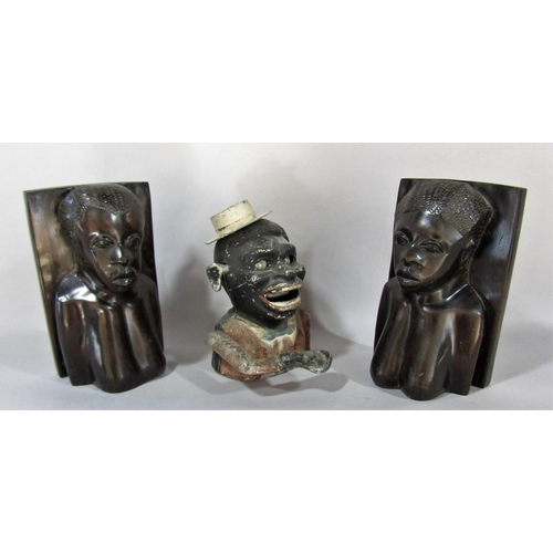 1517 - A pair of African carved hardwood book ends of female heads, a mechanical money box, silver plate fl... 