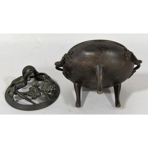 1518 - A small bronze koro with prunus flower cover and handles raised on three slender supports, 13cm x 11... 