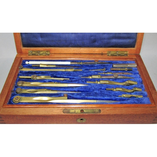 1522B - A collection of vintage draughtsman’s drawing instruments some complete sets in their original mahog... 