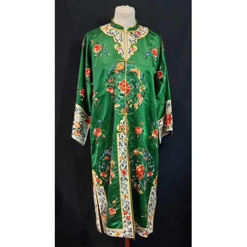 1546 - Kimono in green silk satin embroidered with flower and moth roundels and with simple frog front fast... 