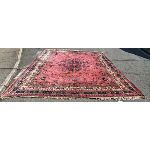 1600 - A large country house Malayer design carpet with a stylised floral centre with further stylised flow... 