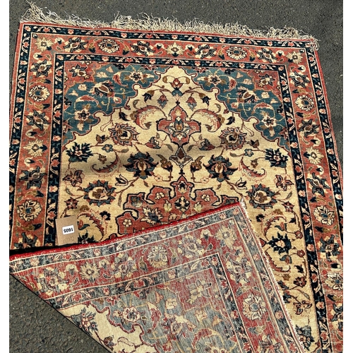 1605 - An old Bidjar type carpet, slightly faded and worn with a floral central medallion and an all over f... 