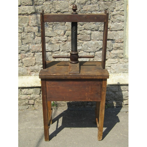 2746 - A 19th century ashwood household linen press with central screw thread over two drawers, 67cm