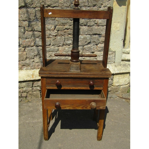 2746 - A 19th century ashwood household linen press with central screw thread over two drawers, 67cm