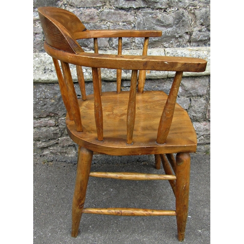 2185 - A Windsor style smokers elbow chair, principally in ash