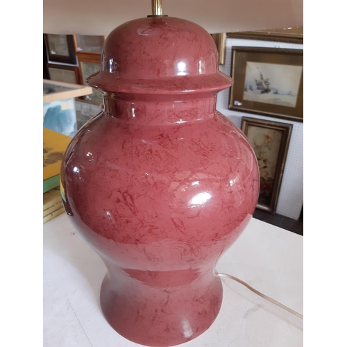 1524 - A Chinese oxblood baluster shaped table lamp 90 cm high