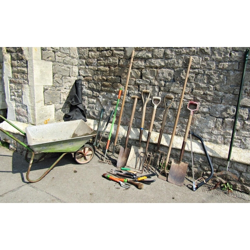 2075 - A small wheelbarrow with galvanised body together with a collection of hand tools